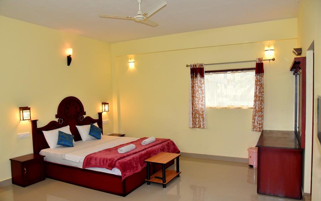 Jungle Palace Homestay Thekkady Værelse billede